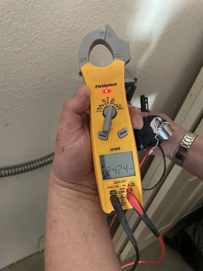 Voltage testing with clamp meter during Circuit Breaker Repair in Weston